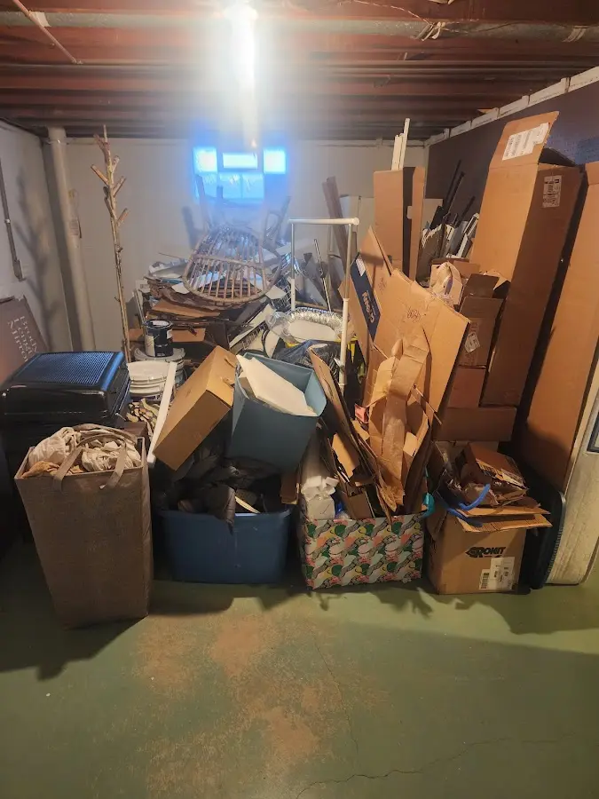 Roll-off dumpster container at job site for 2 Yard Dumpster Rental in Chattahoochee